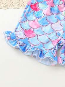 Set de 2 piezas con camiseta de niña pequeña suave y cómoda con volantes, estampado de concha de sirena y efecto ombré, y pantalones cortos deportivos con estampado de escamas en degradado