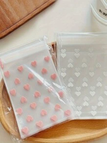50pcs Self-Adhesive Plastic Bags With Heart Pattern, Anti-Pollution, Disposable, Multi-Purpose Gift Packaging Material - Ideal For Gifts And Birthday Presents!