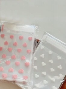 50pcs Self-Adhesive Plastic Bags With Heart Pattern, Anti-Pollution, Disposable, Multi-Purpose Gift Packaging Material - Ideal For Gifts And Birthday Presents!