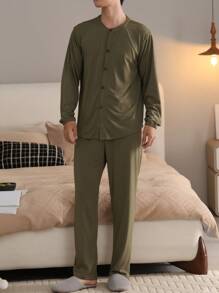 Conjunto de pijama para hombres de 2 piezas, camisa de manga larga con cuello redondo y abotonadura, y pantalones largos sólidos clásicos y cómodos que absorben la humedad. Conjunto de ropa de dormir casual y de moda.