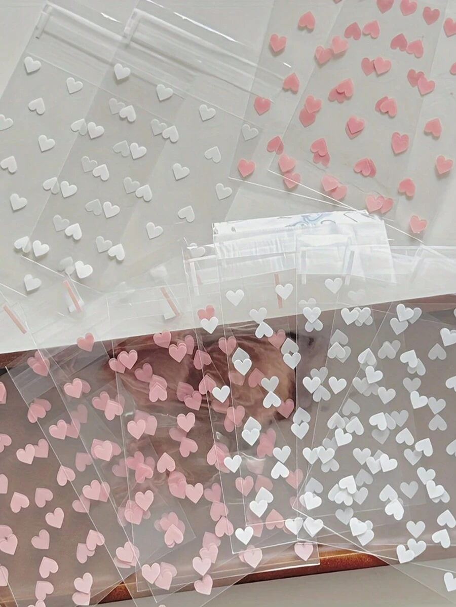 50pcs Self-Adhesive Plastic Bags With Heart Pattern, Anti-Pollution, Disposable, Multi-Purpose Gift Packaging Material - Ideal For Gifts And Birthday Presents!