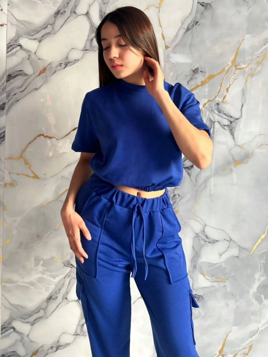 Conjunto de dos piezas para mujer: top informal de manga corta con cuello redondo y pantalones largos con bolsillo con cordón - Azul - Ver 1
