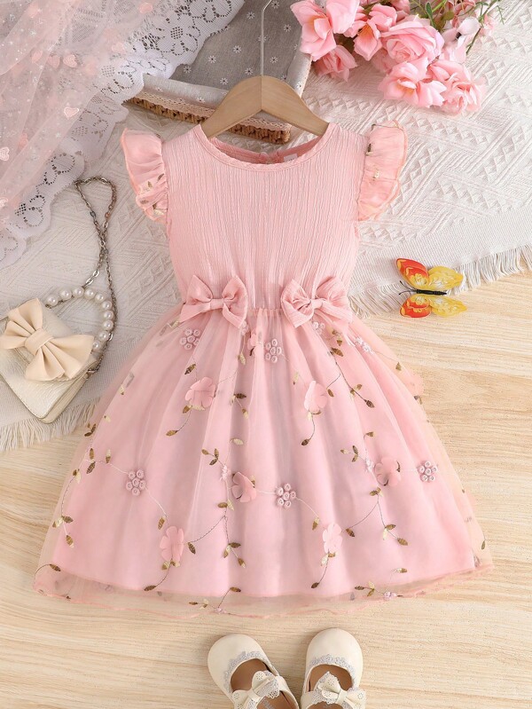 Kleine Mädchenkleid mit Puffärmel, Schleifen-Dekor und besticktem Tüllrock im Prinzessinnenstil
