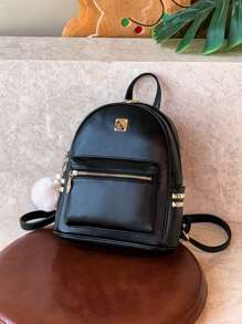 Mochila mini decorada con remaches y accesorios