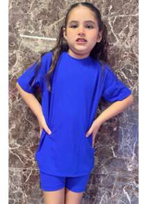 Esta playera oversize para niña es la elección perfecta para un look cómodo y a la moda. Confeccionada en tela acantalabada, es suave y ligera, ideal para el día a día. Su diseño con manga caída le da un toque relajado y moderno, mientras que el corte biker agrega un estilo juvenil y urbano. Perfecta para las pequeñas que buscan comodidad sin perder el estilo. ¡Una prenda versátil que combina perfectamente con cualquier conjunto casual - azul real - Ver 2