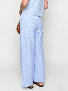 Damskie spodnie casualowe w kratę z prostymi nogawkami