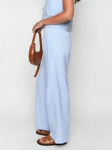 Damskie spodnie casualowe w kratę z prostymi nogawkami