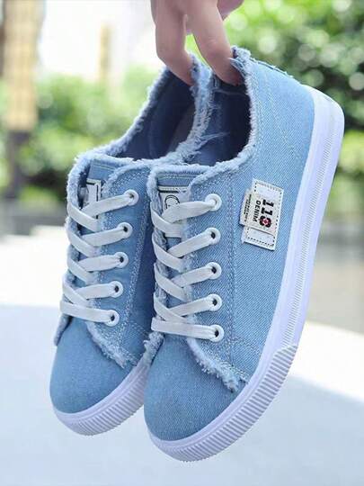 Zapatillas de lona sencillas y modernas de caña baja para hombres y mujeres, zapatos de lona con cordones para estudiantes de nicho versátiles para primavera y otoño