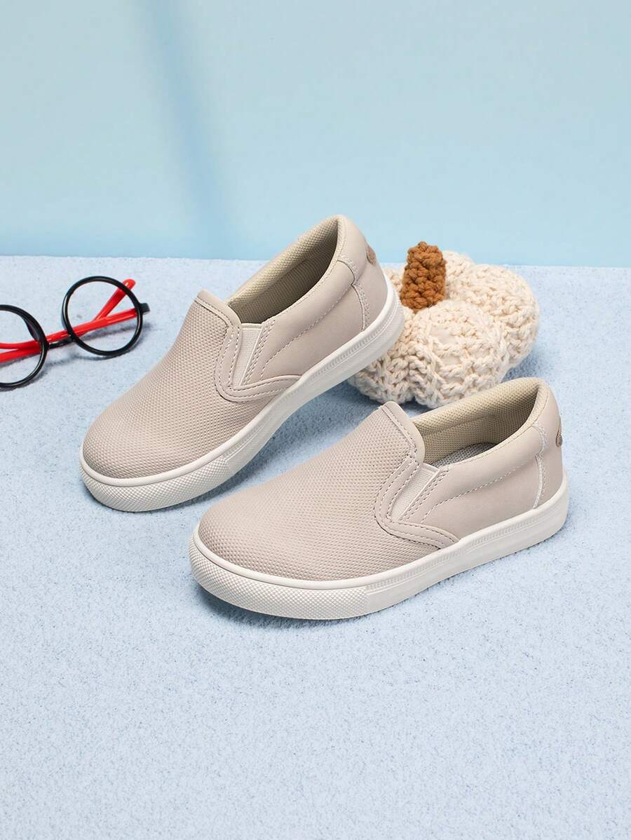 1 par de zapatillas de moda de estilo simple de unicolor de PU elástico de bajo perfil unisex para niños, zapatos casuales cómodos para vacaciones, fiestas y deportes, zapatos planos impermeables antideslizantes para niños pequeños para uso en exteriores