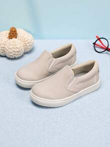 1 par de zapatillas de moda de estilo simple de unicolor de PU elástico de bajo perfil unisex para niños, zapatos casuales cómodos para vacaciones, fiestas y deportes, zapatos planos impermeables antideslizantes para niños pequeños para uso en exteriores