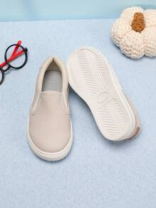 1 par de zapatillas de moda de estilo simple de unicolor de PU elástico de bajo perfil unisex para niños, zapatos casuales cómodos para vacaciones, fiestas y deportes, zapatos planos impermeables antideslizantes para niños pequeños para uso en exteriores