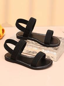 1 paar meisjes eenvoudige effen zwarte casual sandalen, zachte en comfortabele stoffen bandjes met TPR-zool, verstelbare dubbele elastische banden, platte hak, geschikt voor school, reizen en dagelijks gebruik