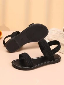 1 paar meisjes eenvoudige effen zwarte casual sandalen, zachte en comfortabele stoffen bandjes met TPR-zool, verstelbare dubbele elastische banden, platte hak, geschikt voor school, reizen en dagelijks gebruik