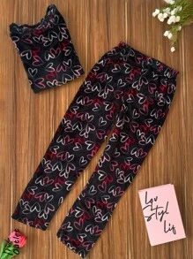 Conjunto de pijama afelpada para mujer, clásica, con hermosos colores y estampados. Camisa de manga larga y cuello redondo, pantalón de ajuste natural con resorte, tela muy suave, ligera, cálida y agradable, ideal para primavera, otoño e invierno. - Negro - Ver 1