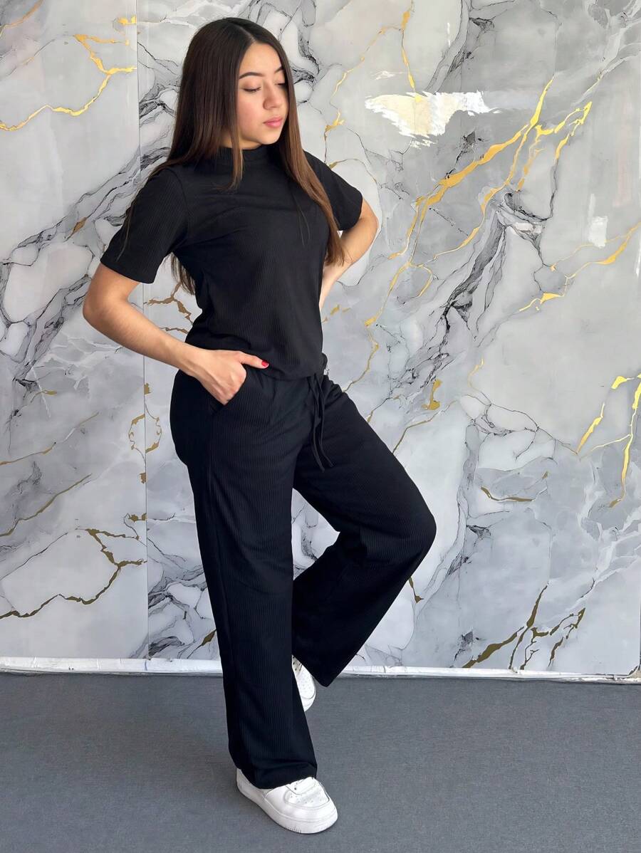 camiseta cuello redondo de hombros caídos y pantalones largos acampanados con cordón delantero y cintura alta moda casual cómoda - Negro - Ver 1