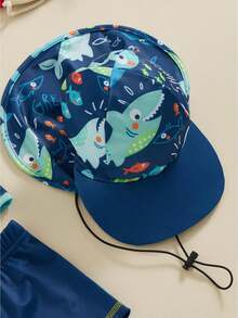 Conjunto de camiseta y shorts de baño de verano para niños y niñas bebés, con estampado de tiburón y delfín, incluye gorra - Azul - Ver 4