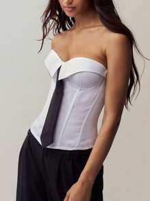 Y2K复古无肩带束身胸衣，带钢骨支撑，后背系带，露脐抹胸上衣，性感设计，专为女性打造。这款束身胸衣采用带衬垫罩杯，结构设计提供支撑和塑形效果，配有牢固的钩扣，以及可拆卸的系带细节，方便您根据自身身材进行调整。适合日常穿着和特殊场合。