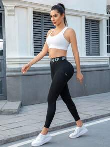Damen Yoga Hose mit hoher Taille und Taschen, Leggings mit Buchstaben-Taillenbund, enge Sporthose aus bequemem, dehnbarem Stoff für Fitness, Gym, sportlich-lässigen Alltag - Schwarz - Übersicht 8