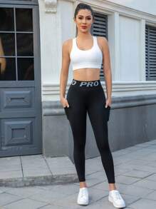 Damen Yoga Hose mit hoher Taille und Taschen, Leggings mit Buchstaben-Taillenbund, enge Sporthose aus bequemem, dehnbarem Stoff für Fitness, Gym, sportlich-lässigen Alltag - Schwarz - Übersicht 4