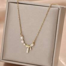1pc Stainless Steel Bowknot Faux Pearl Pendant Necklace, Creative Design Simple Personalized Fashion Vintage Casual Fashionable Gift For Valentine's Day, Islamic New Year, Daily Wear, Street Party (OPP Bag & Gift Box For Shooting Only)