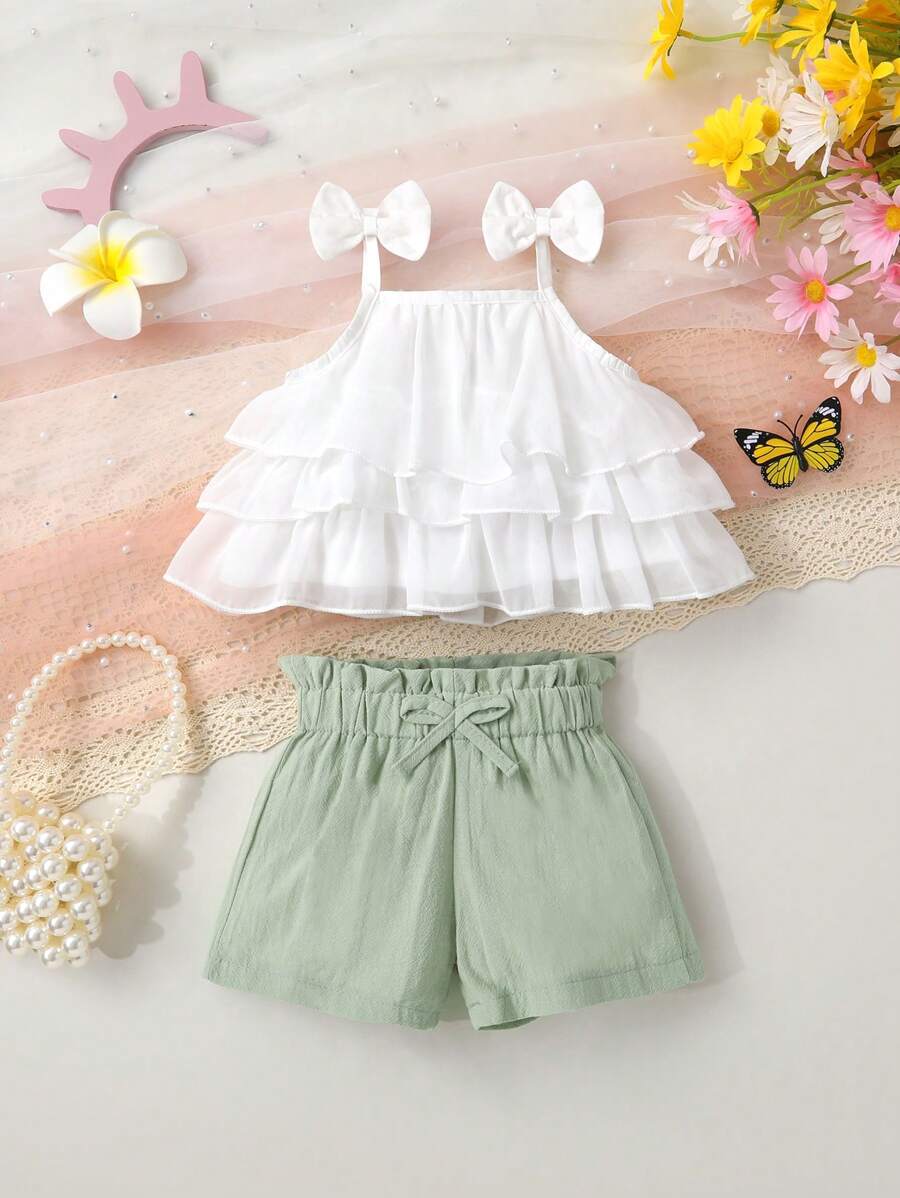 Baby Girl Cute Fashion Comfortable Casual Bow Decor Layered Ruffle Camisole Top And Solid Color Paper Bag Waist Shorts Set, Suitable For Summer Daily Outing, Vacation, Party - White - View 1