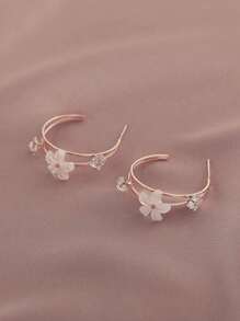 1 par de aretes elegantes y lujosos de metal y resina con diseño floral para mujeres