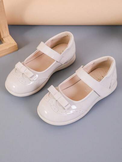1 đôi giày bệt kiểu dáng tối giản, màu trơn, họa tiết nơ, thích hợp cho mùa xuân/hè, thoải mái cho học sinh và đi làm, phù hợp cho mọi mùa.