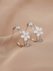 1 par de aretes elegantes y lujosos de metal y resina con diseño floral para mujeres