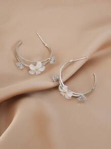 1 par de aretes elegantes y lujosos de metal y resina con diseño floral para mujeres