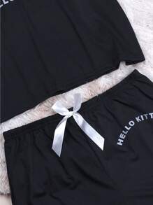 Sanrio Conjunto de tres piezas de pijama de verano para mujer autorizado por Sanrio con top de manga corta, shorts y pantalones estampados con diseño de KT de estilo suelto y casual, elegante para el hogar y de vacaciones