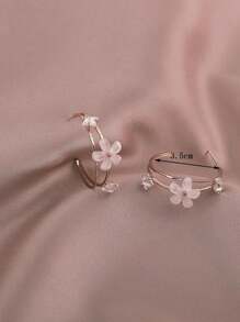 1 par de aretes elegantes y lujosos de metal y resina con diseño floral para mujeres