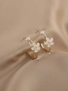 1 par de aretes elegantes y lujosos de metal y resina con diseño floral para mujeres