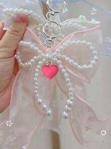 Schattige en eenvoudige mode kraal imitatie parel strik roos rood hart tas hanger, glanzend en kleurrijk licht, strik met gekleurde bloemen, doe-het-zelf effen kleur kant met klinknagels imitatie parel strik hanger mobiele telefoon schelp hanger, strik lint, multifunctionele doe-het-zelf sleutelhanger