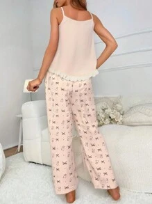 2 件套女士无袖宽松睡衣套装，包括无袖圆领衬衫，带有毛绒小狗刺绣和蕾丝花边，以及全身印花熊和蝴蝶结长裤，舒适、吸湿排汗，适合春秋休闲装