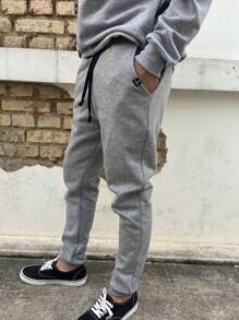 Calça Jogger de Moletom Feminio e Masculino Slim Skinny Academia/Casual/Treino/Trabalho P ao G - Cinza - Visão 4