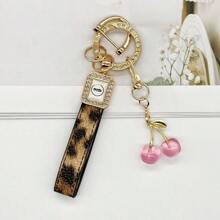 TTOBS 1pc Handmade Leopard Leather Car Key Chain With Unique Cherry Pendant - , Fashionable And Multifunctional Backpack Key Chain, Perfect Accessory For Backpacks. An Ideal Gift For St. Patrick's Day, Valentine's Day, Or For Your Beloved Lady. - Multicolor - View 17