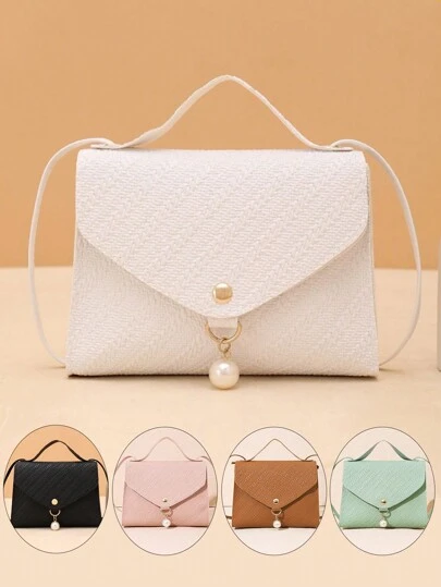 Färgblocksväska med kedjerem och låsspänne, kan bäras som axelrem eller handväska