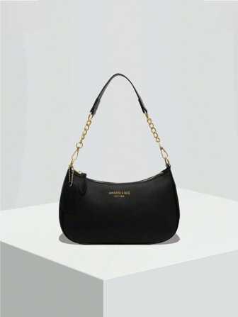 The New Fashion Classic Wild Letter Pattern Decoration Design Solid Color Pu Waterproof Fabric Shoulder Crescent Bag Underarm Bag Is Suitable For Shopping And Can Be Slung.