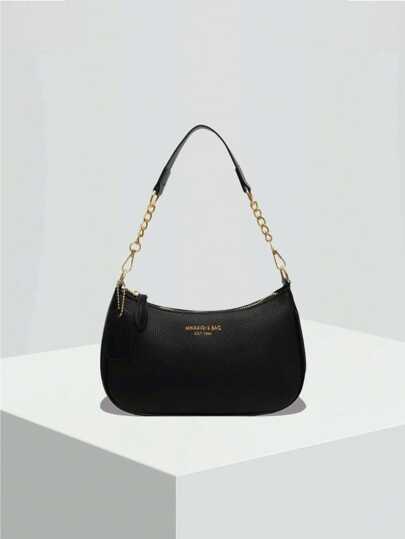 The New Fashion Classic Wild Letter Pattern Decoration Design Solid Color Pu Waterproof Fabric Shoulder Crescent Bag Underarm Bag Is Suitable For Shopping And Can Be Slung.