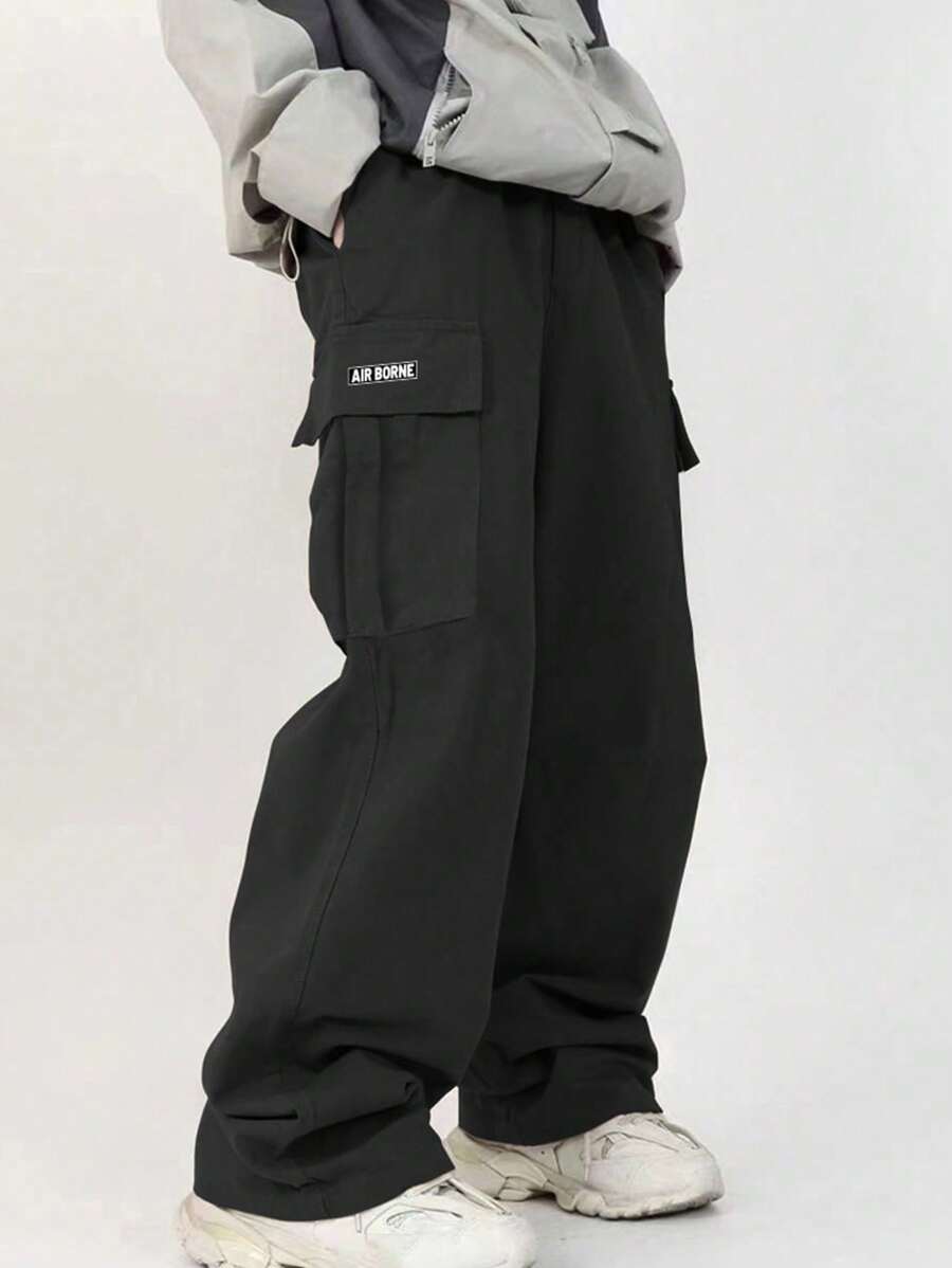 1 pezzo Pantaloni cargo da ragazzo adolescente, casual, sportivi, da esterno, con tasche e decorazione di lettere a strappo, gamba dritta, per primavera e autunno