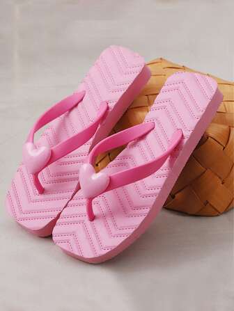 女士粉色心形图案厚底人字拖，采用特色缝线设计，情侣必备沙滩装，防滑，舒适凉鞋