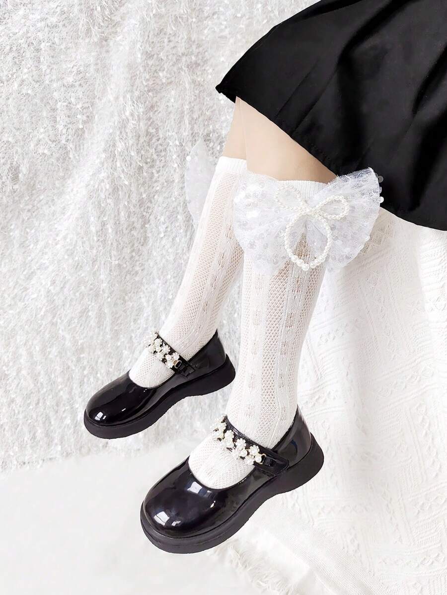 1 双女孩优雅缎面蝴蝶结网眼袜