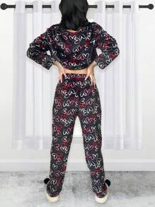 Classic Women's Plush Pajama Set With Beautiful Colors And Prints. Long-Sleeved Shirt With Round Neck. Straight Leg Pants, Natural Waist Fit With Elastic, Very Soft, Light, Warm And Pleasant Fabric, Ideal For Spring, Autumn And Winter. - 黑色 - 查看 3