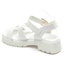 Sandali grossi à double sposa con boucle dorée et semelle crantée