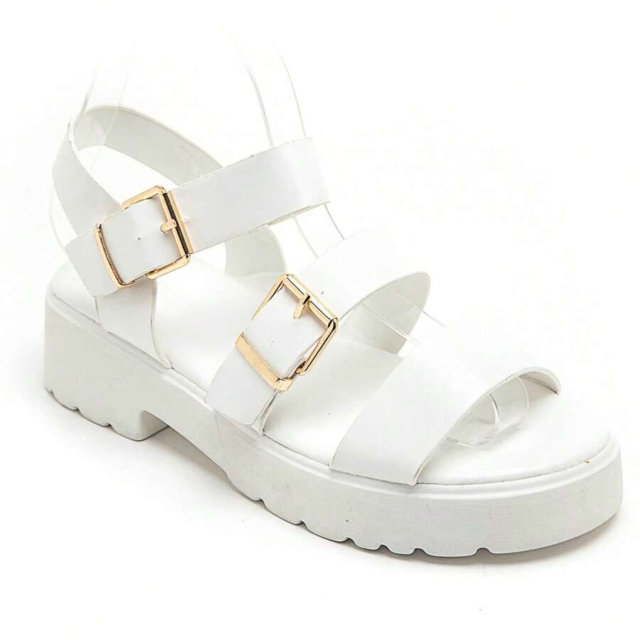 Sandali grossi à double sposa con boucle dorée et semelle crantée