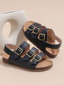 1 Paar schwarze Sandalen für Kleinkind/Babys in großer Größe, Komfortabler römischer Stil, PU-Riemen mit verstellbarem Metallschnallenverschluss, runde Zehenkappe, rutschfeste Gummisohle, modisch niedliche flache Sandalen für Jungen und Mädchen von 3-12 Jahren, für Alltag, Outdoor, Urlaub, Frühling/Sommer