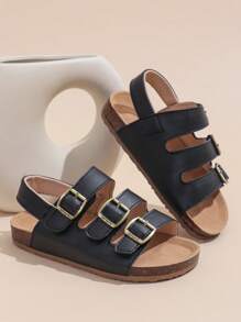 1 Paar schwarze Sandalen für Kleinkind/Babys in großer Größe, Komfortabler römischer Stil, PU-Riemen mit verstellbarem Metallschnallenverschluss, runde Zehenkappe, rutschfeste Gummisohle, modisch niedliche flache Sandalen für Jungen und Mädchen von 3-12 Jahren, für Alltag, Outdoor, Urlaub, Frühling/Sommer