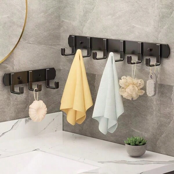Gancho para colgar ropa, para ser colgado detrás de la puerta del dormitorio. No es necesario perforar agujeros. Montado en la pared, con adhesivo resistente. Hecho de acero inoxidable. Es un excelente artículo para el almacenamiento de toallas.