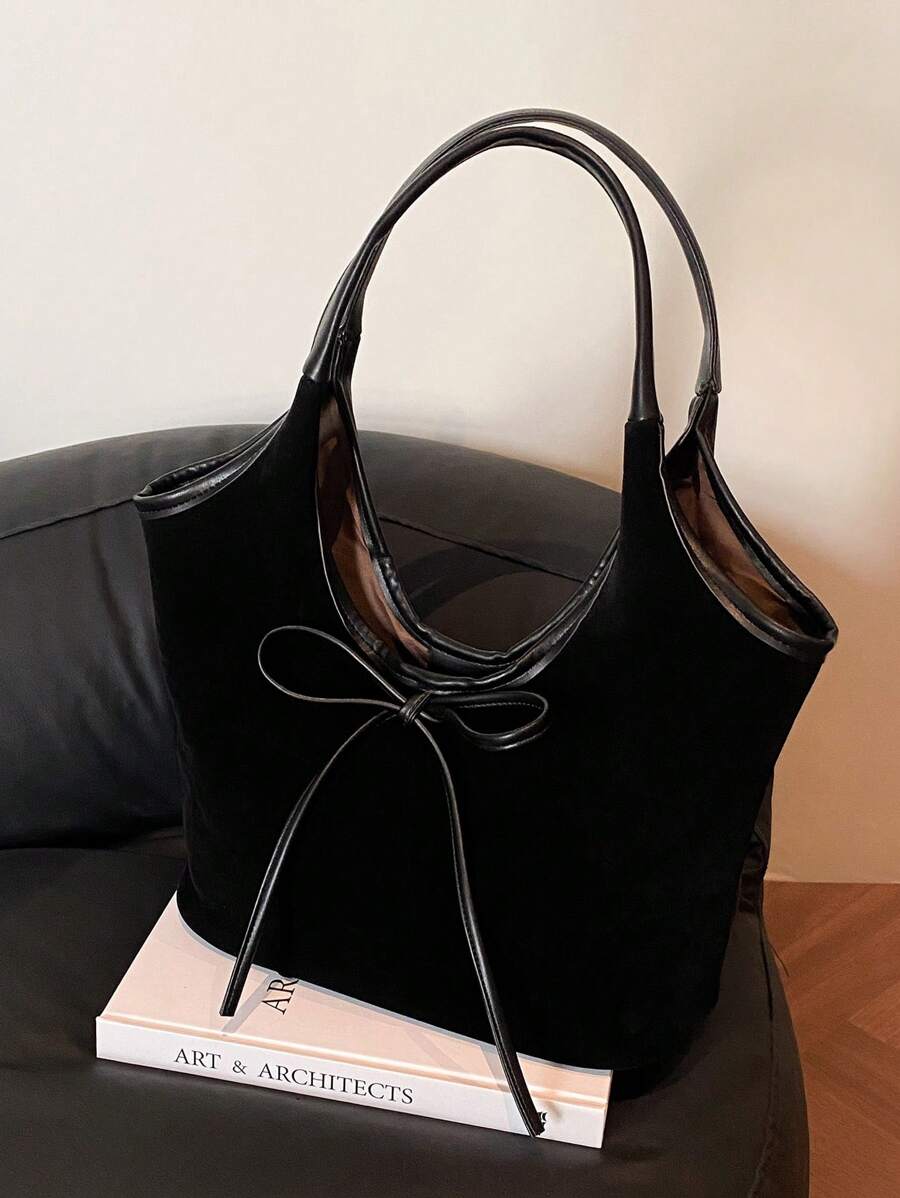 复古绒面革手提包大容量休闲单肩包，带字母浮雕、蝴蝶结装饰和抽绳，适合女士，优雅多用途通勤包