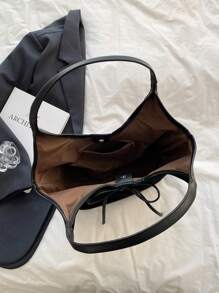 复古绒面革手提包大容量休闲单肩包，带字母浮雕、蝴蝶结装饰和抽绳，适合女士，优雅多用途通勤包